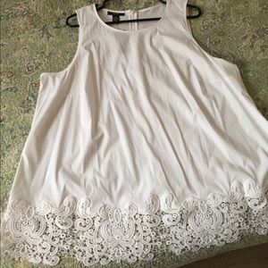 White sheer sleeveless top with lace on bottom